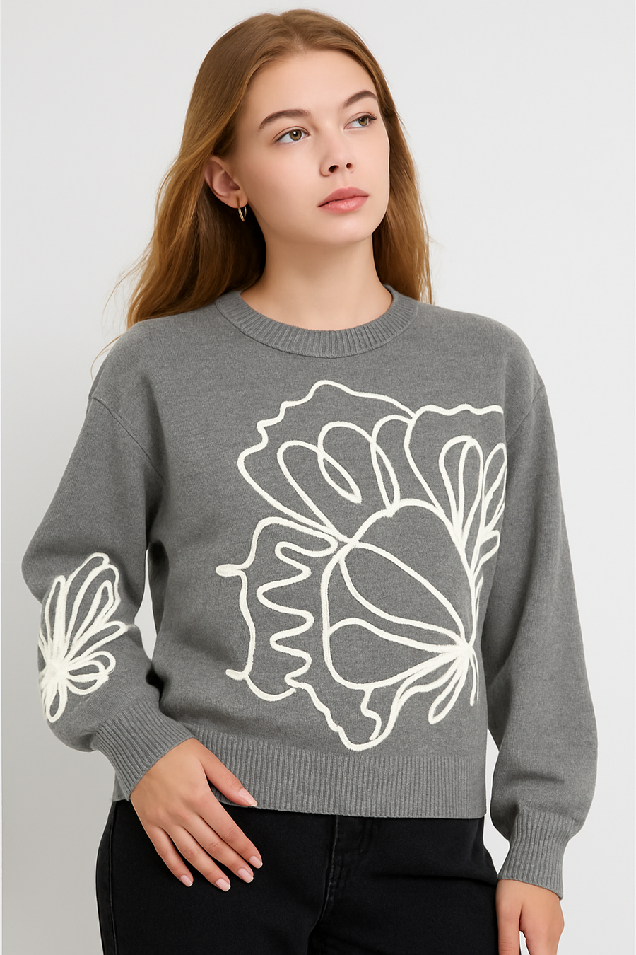 KNITTED JUMPER WITH FRONT AND SLEEVE DESIGN