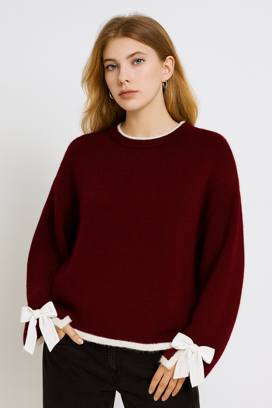 KNITTED JUMPER WITH CONTRASTING EDGING AND DECORATIVE BOW ON SLEEVES