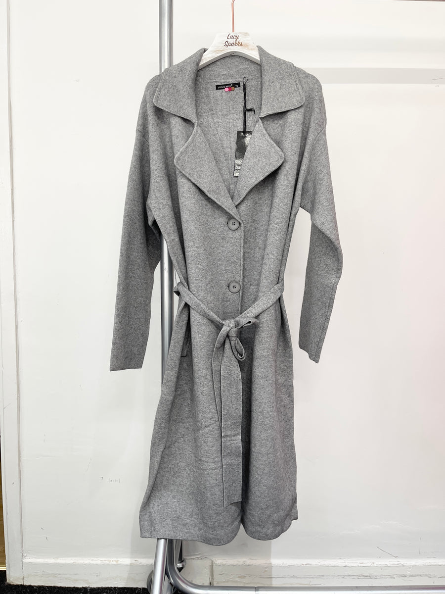 Heavy Knit Coat With Lapel, Waist Belt, Jet Pockets And Button Fastening