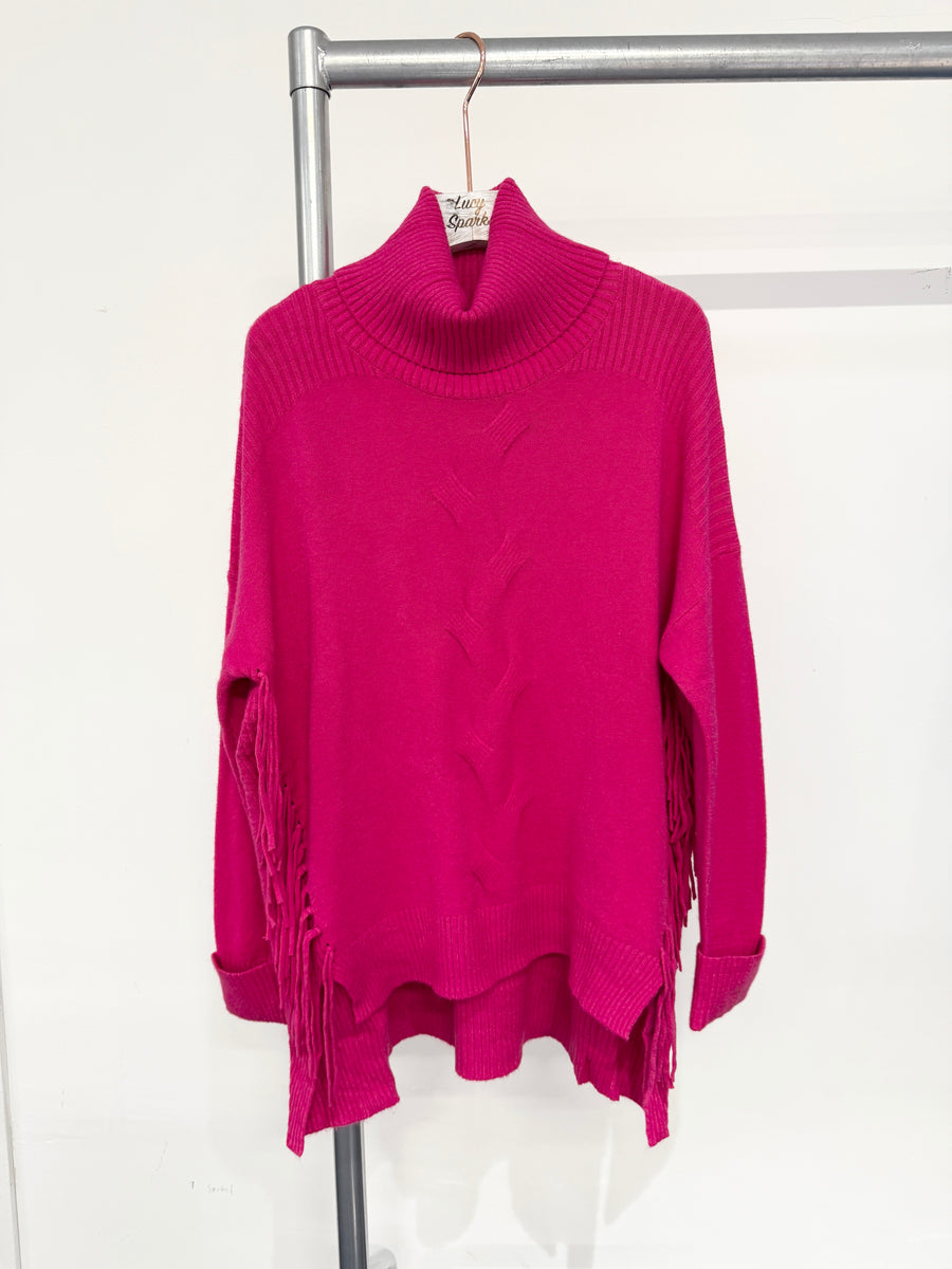 Soft Knit Jumper With Roll Neck,Rolled Sleeve Cuffs, Ribbed Shoulders, Cable Knit Design On Front And Side Tassels