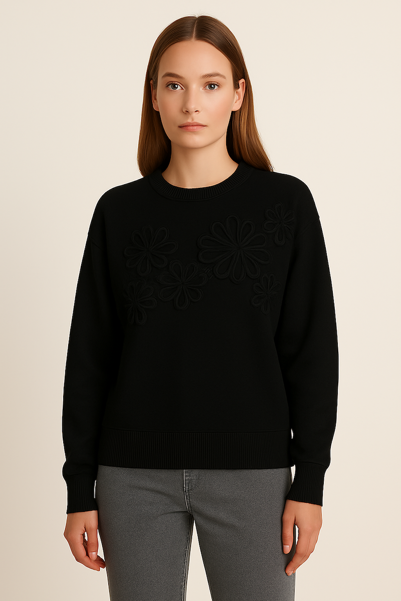 soft knit jumper with round neck and decorative laced flower design at the front