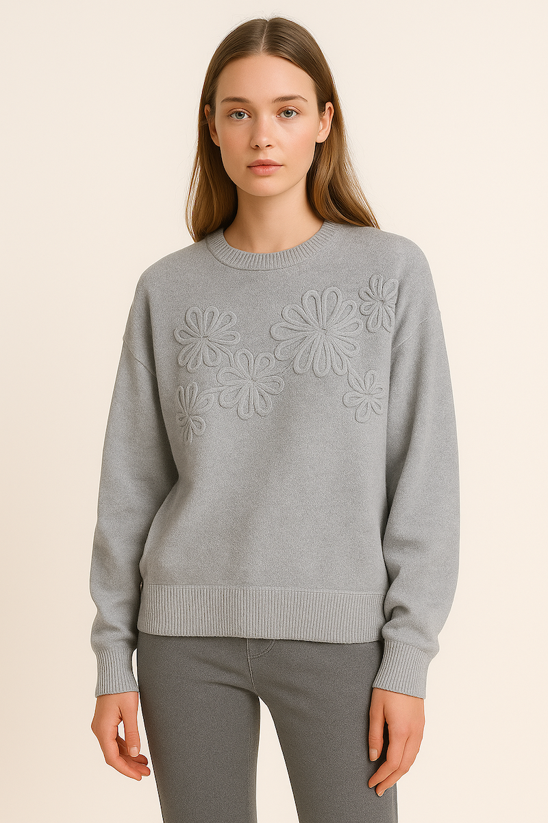 soft knit jumper with round neck and decorative laced flower design at the front