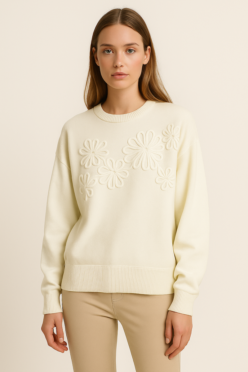 soft knit jumper with round neck and decorative laced flower design at the front