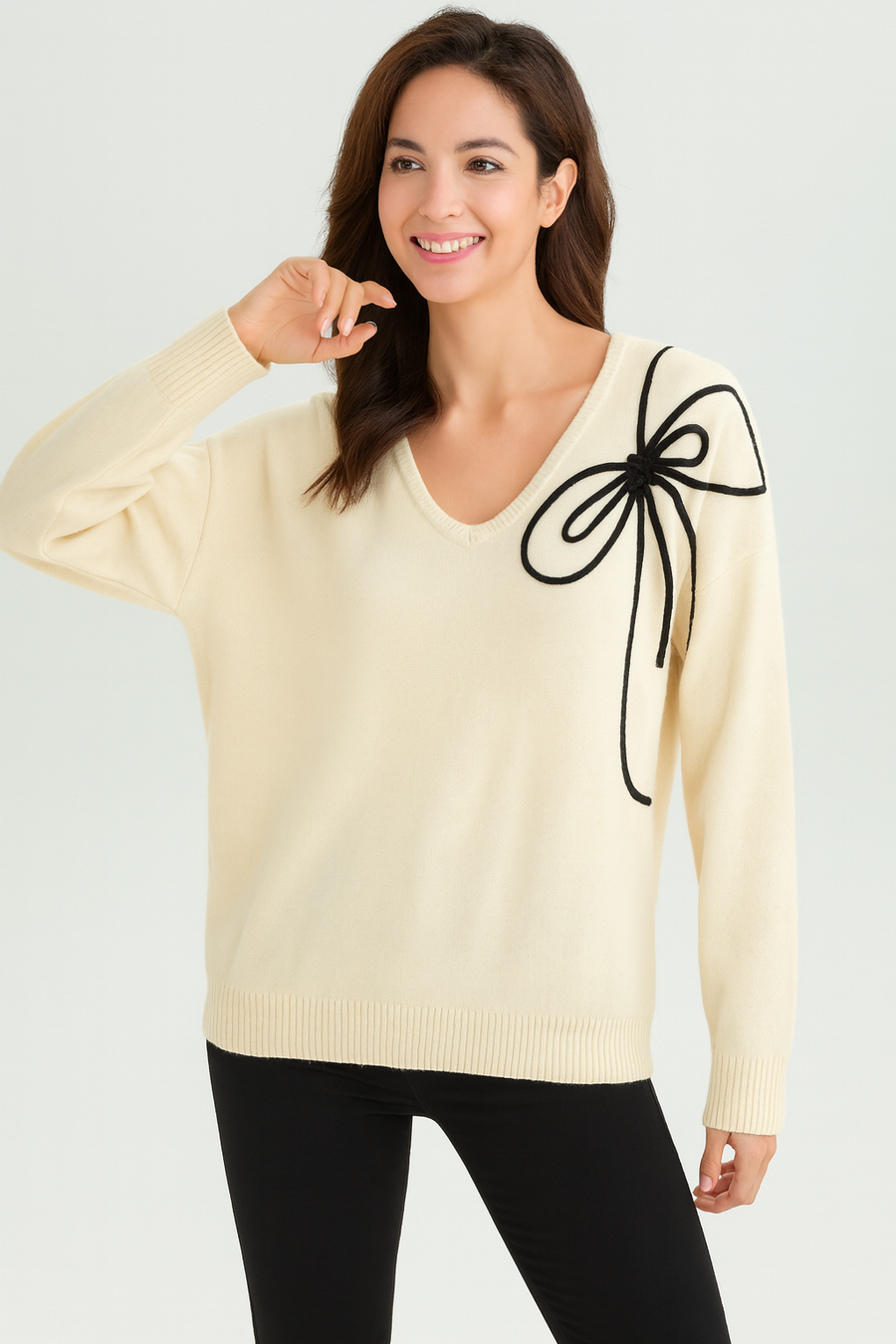 SOFT KNIT JUMPER WITH BOW DESIGN