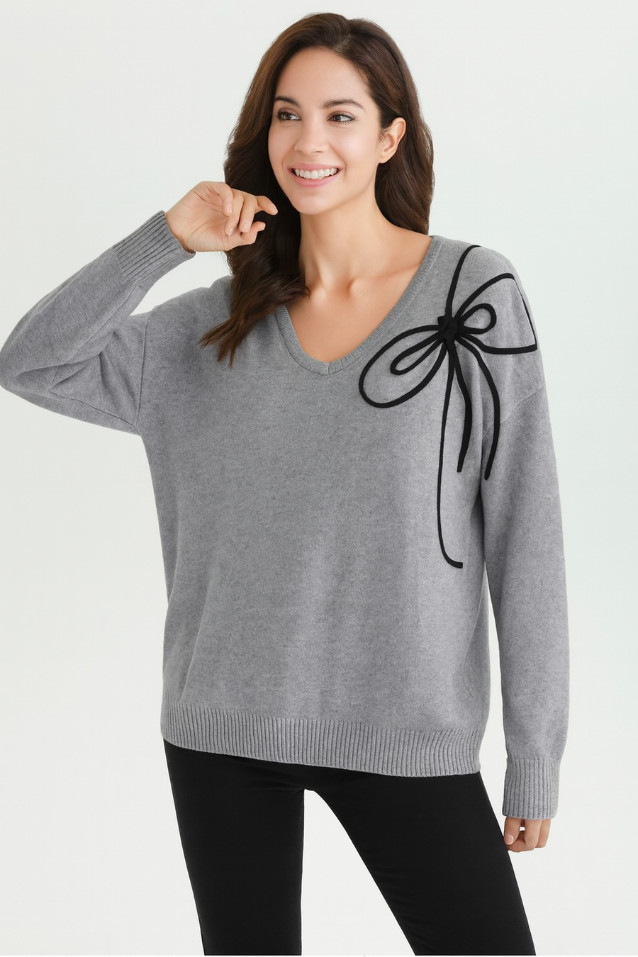 SOFT KNIT JUMPER WITH BOW DESIGN