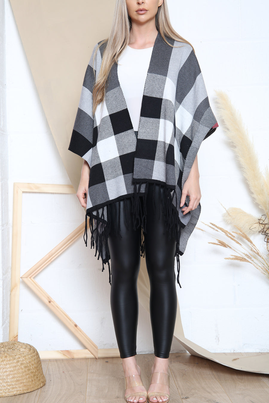 Grey checkered pattern poncho