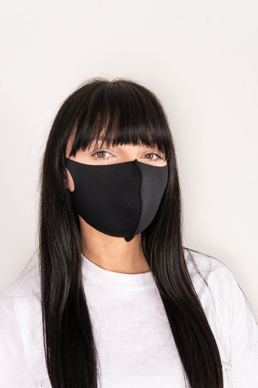 Neoprene face mask with ear straps.