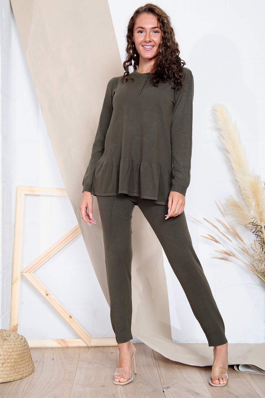 Long sleeve loungewear set with sparkle button up collar and ruffled hem.